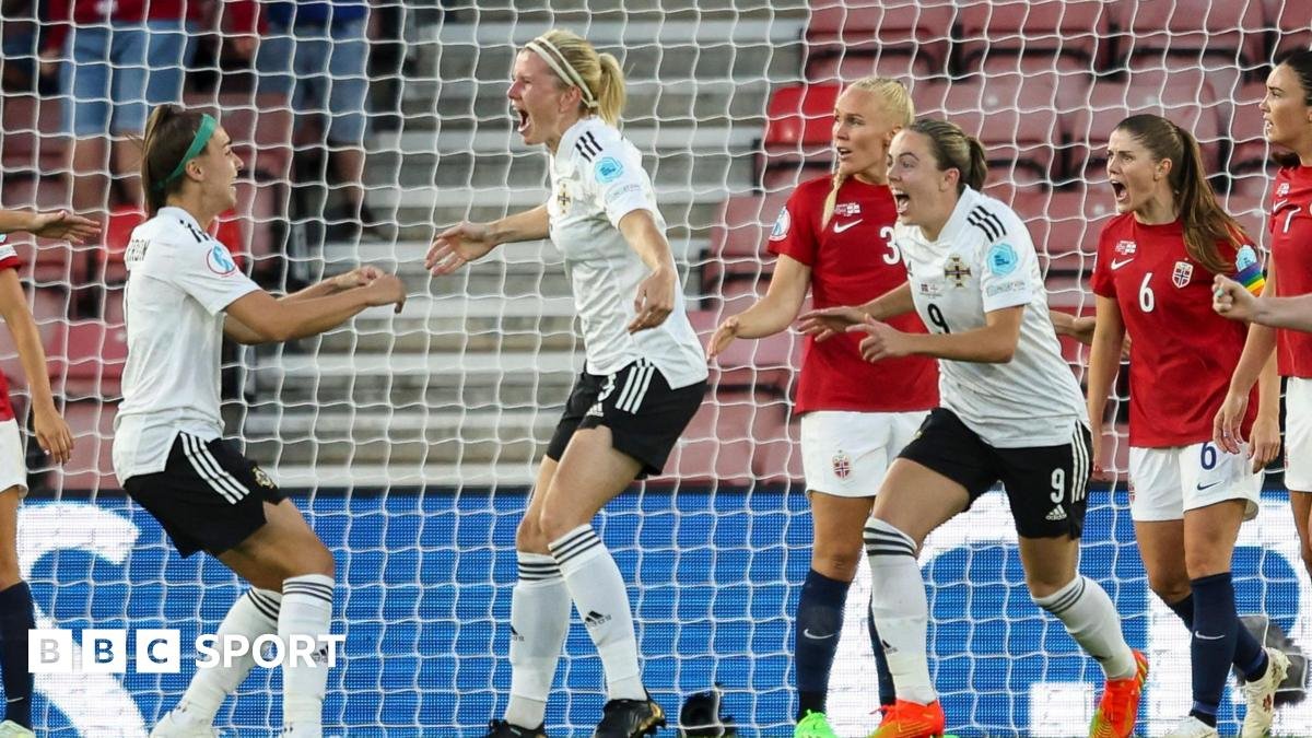 Julie Nelson celebrates her goal